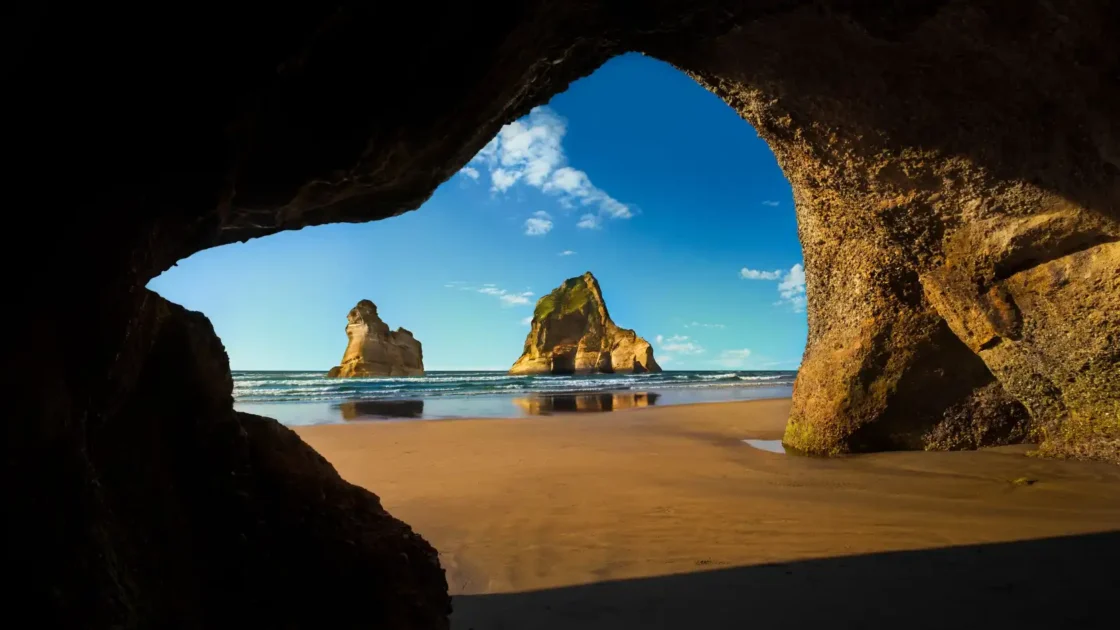Wharariki Beach has no lifeguard and a growing crowd chasing a decade-old wallpaper